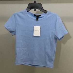 Blue cropped shirt, brand new, womens medium.